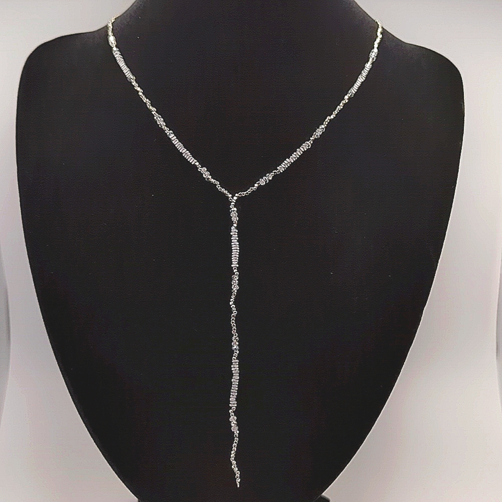 Silver necklace with small grey stone and rhinestone accents